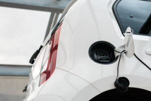 Charging electro car at the electric gas station.